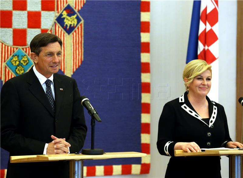 Grabar-Kitarović i Pahor se susreli na neformalnoj radnoj večeri