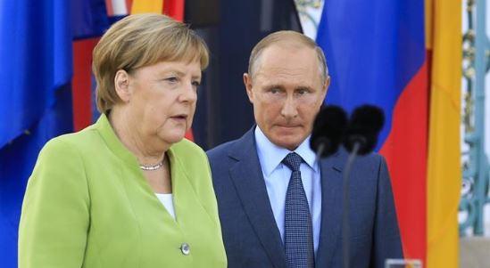 Merkel: Rusija vodi hibridni rat