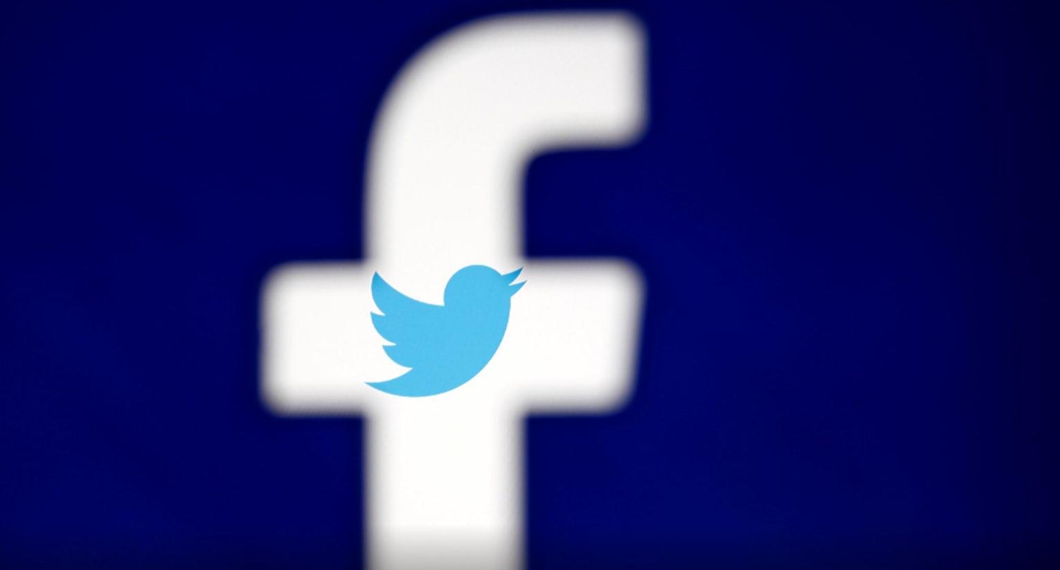 A 3D-printed Facebook logo is displayed in front of the Twitter logo - Avaz