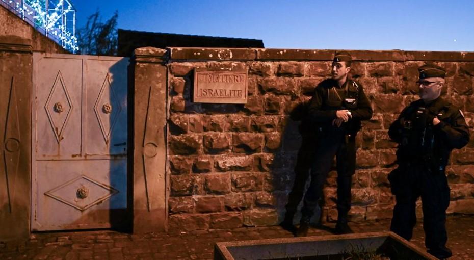 Dozens of French graves defaced with swastikas