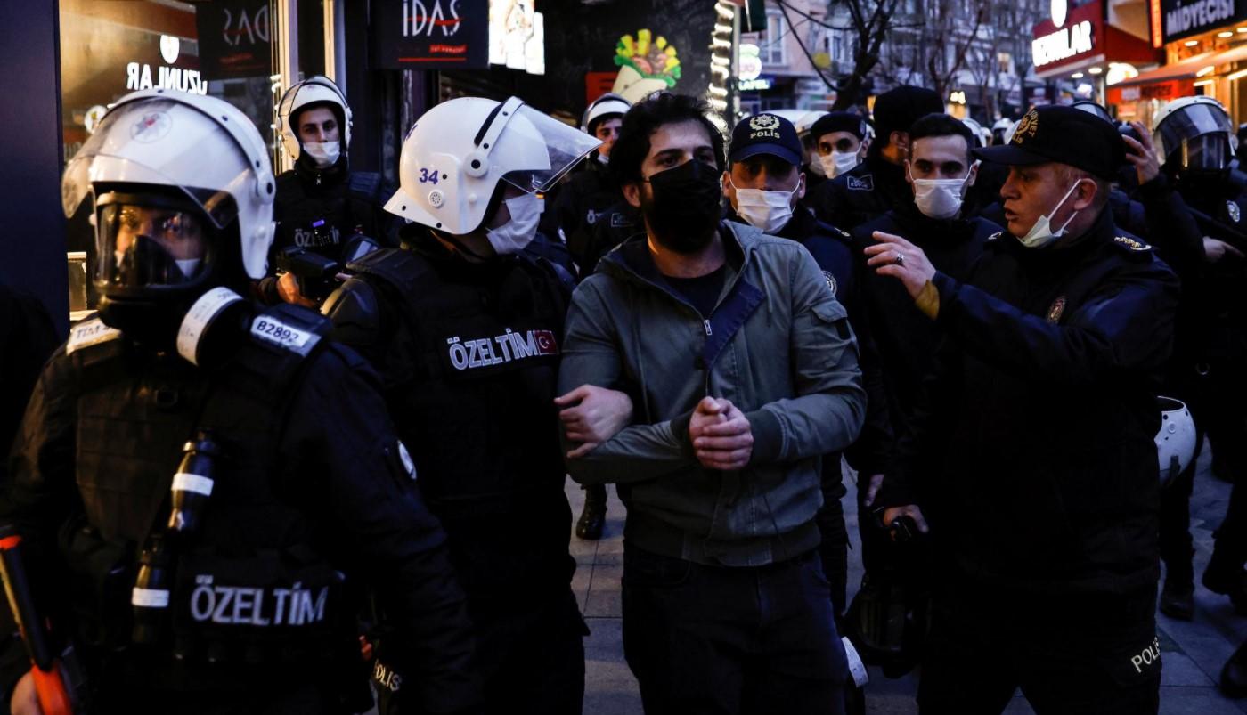 Riot police detain a protester during a gathering in solidarity with Bogazici University students who are protesting against the appointment of Melih Bulu as new rector of the university, in Istanbul, Turkey, February 2, 2021. - Avaz