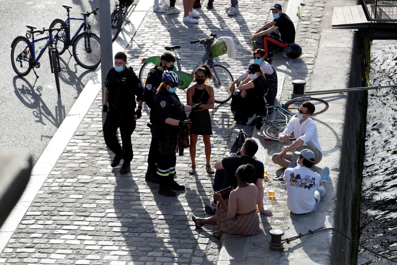 France to ban outdoor drinking under new virus restrictions