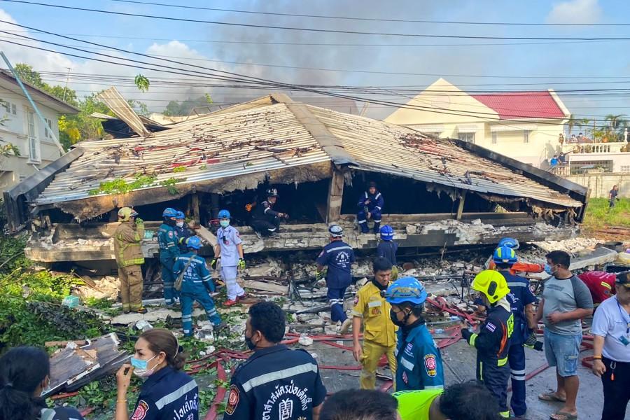 At around 7 am, as firefighters and rescue workers were moving through the razed structure in the Thai capital, it abruptly collapsed, killing at least four, including a resident - Avaz