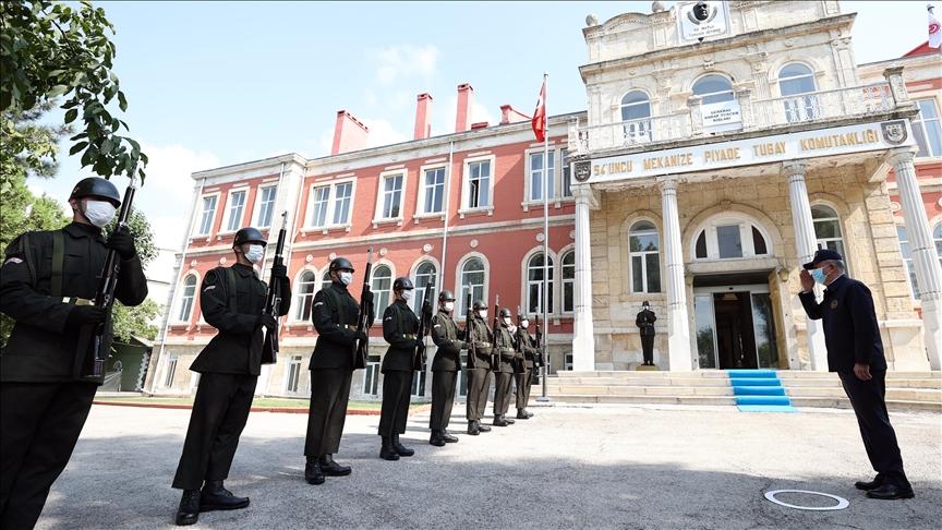 Turkish National Defense Minister Hulusi Akar (R) greets honor guards during his visit to the 54th Mechanised Infantry Brigade in Edirne, Turkey on August 29, 2021. - Avaz