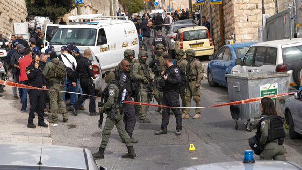 An Israeli policeman secures a shooting attack site in east Jerusalem, Saturday, Jan. 28, 2023. A Palestinian gunman opened fire in east Jerusalem on Saturday, wounding at least two people less than a day after another attacker killed seven outside a synagogue there in the deadliest attack in the city since 2008. - Avaz