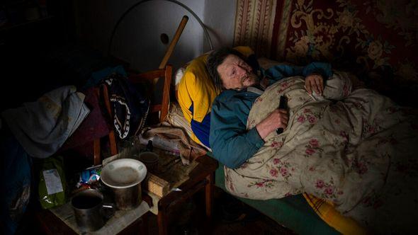 Suffering from cancer, Gennadiy Shaposhnikov, 83, rests in his partially destroyed home which was hit by Russian shelling last fall in Kalynivske, Ukraine - Avaz